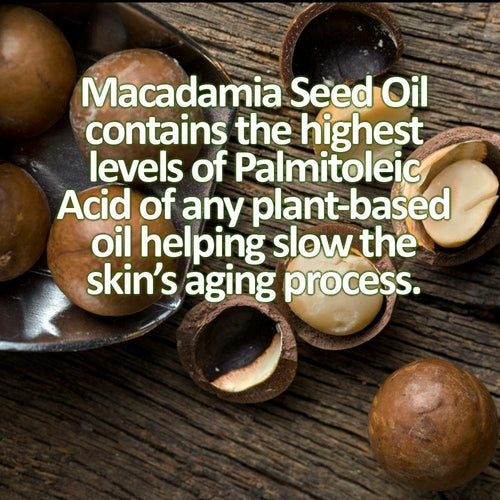 Macadamia nuts with text about macadamia seed oil's benefits on a wooden surface