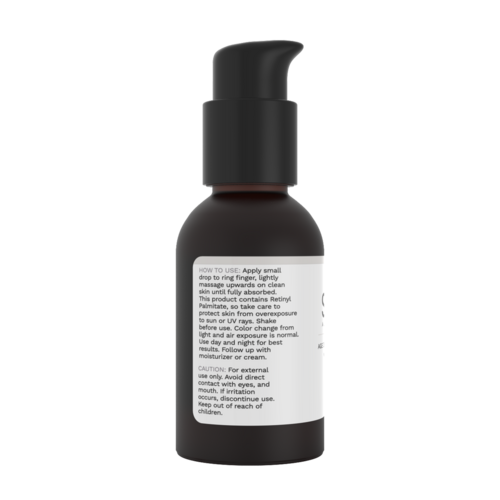 Skincare bottle with pump and label on a white background