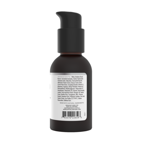 Black skincare bottle with pump and label on a white background